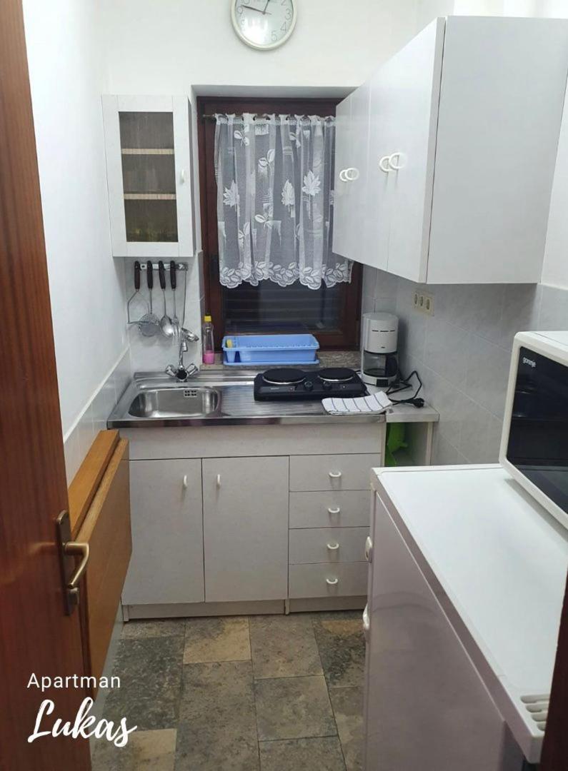 Apartmani Mazzarolli Jadranovo Habitación foto